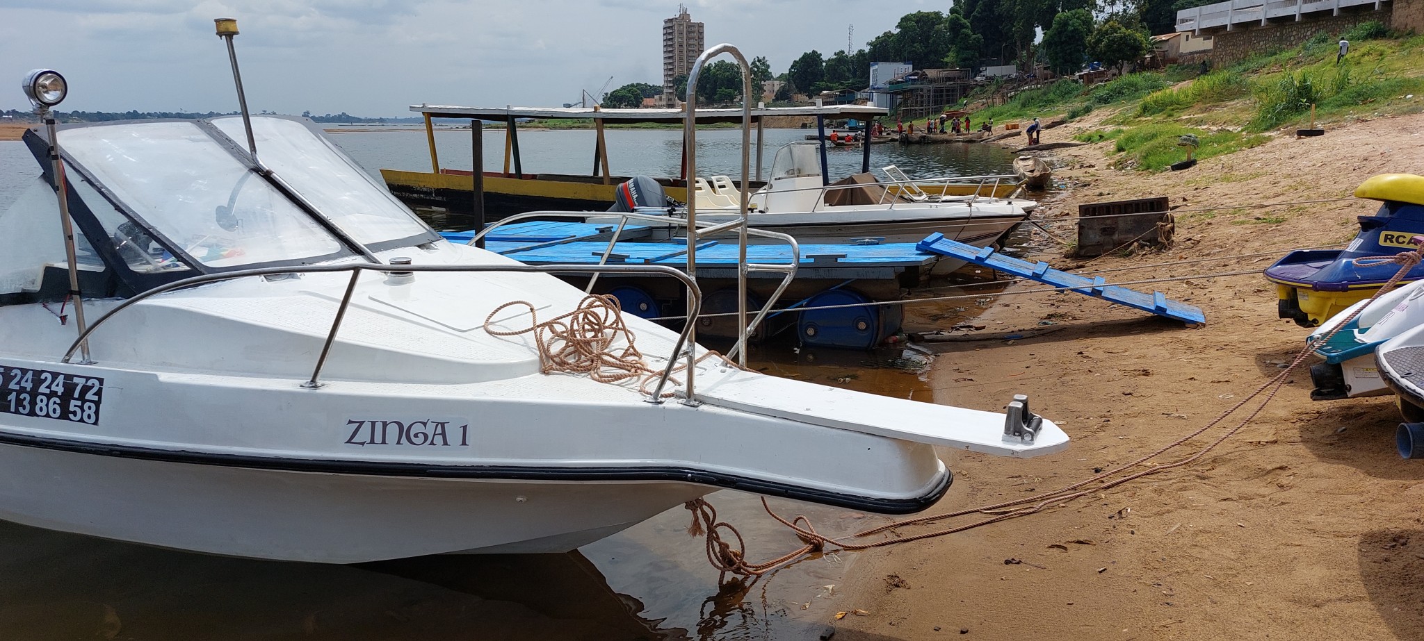 A white boat labeled